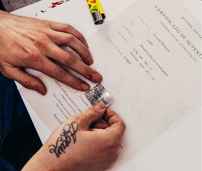 Kende - Original artwork certification process with holographic sticker